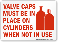 Valve Caps Must Be In Place Sign