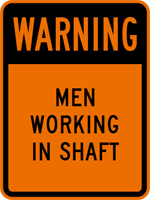 Men working in shaft sign