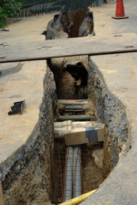 Trench with hidden pipes