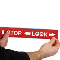 Floor tape with stop look message