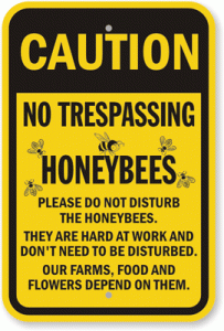 caution no trespassing honebees sign