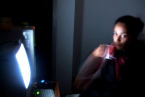 photo of girl and light from computer