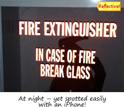 Reflective fire extinguisher sign