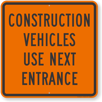 Construction Vehicles Use Next Entrance Sign