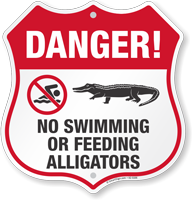 Danger No Swimming Or Feeding Alligators Shield Sign