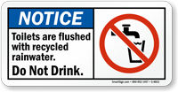 Toilets Are Flushed with Recycled Rainwater Sign