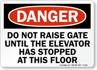 Dont Raise Gate Until Elevator Stops Sign