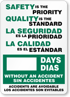 Bilingual Safety Priority. Quality Standard. La Seguridad Sign