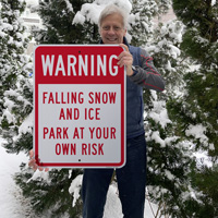 Falling ice and snow park at your own risk sign