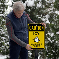 Icy warning sign walk like a penguin