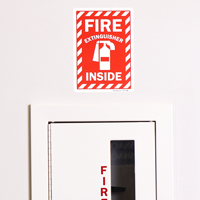 Fire extinguisher inside safety sign