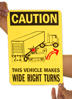 Caution Vehicle Makes Wide Right Turns Signs