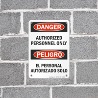 English and Spanish Authorized Personnel Signage